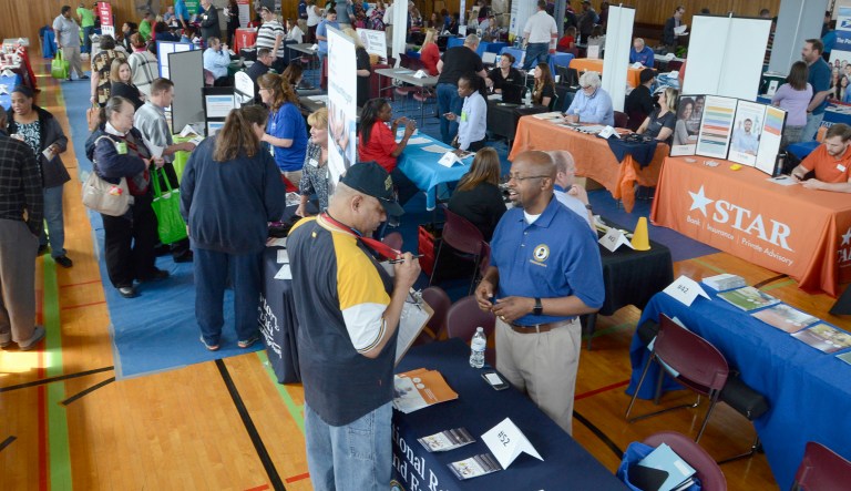 Veterans check out a variety of booths offering job information and employment help during the Job Fair at the Marion VA Medical Center in Marion, Ind., on Wednesday, May 2, 2018. 