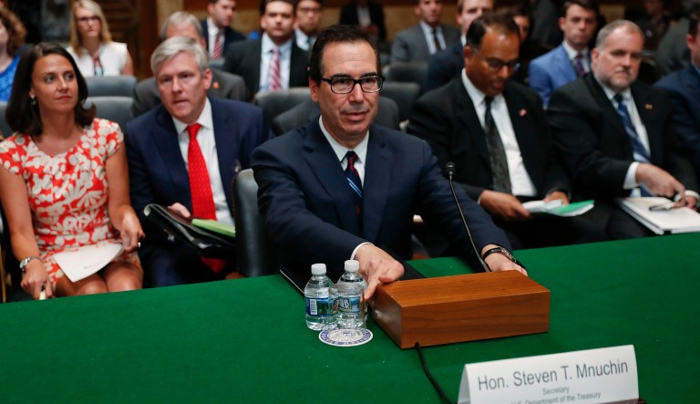 Treasury Secretary Steven Mnuchin takes his seat before testifying before the Senate Appropriations Financial Services and Government Subcommittee hearing. 