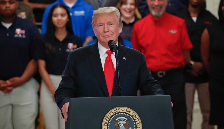 President Trump pauses while speaking before signing an Executive Order that establishes a National Council for the American Worker. 