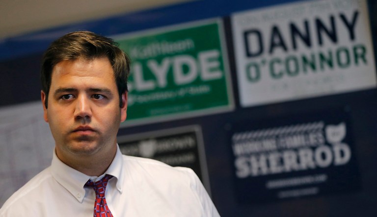 Danny O'Connor, a candidate in a special election to fill the unexpired term of former U.S. Rep. Pat Tiberi, listens to Boston Mayor Marty Walsh at the Democrat Party office in Delaware, Ohio. 