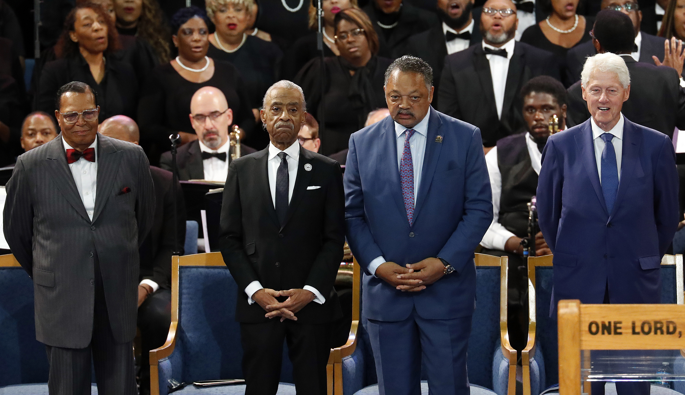 Bill Clinton sits with Nation of Islam leader Louis Farrakhan at Aretha Franklin funeral