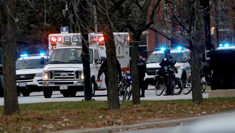 An ambulance believed to be carrying an injured Chicago police officer departs Mercy Hospital.