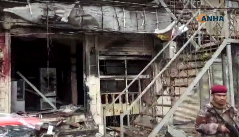 This frame grab from video provided by Hawar News, ANHA, the news agency for the semi-autonomous Kurdish areas in Syria, shows a damaged restaurant where an explosion occurred, in Manbij, Syria, Wednesday, Jan. 16, 2019. The Britain-based Syrian Observatory for Human Rights, a Syrian war monitoring group, and a local town council said Wednesday that the explosion took place near a patrol of the U.S.-led coalition and that there are casualties.