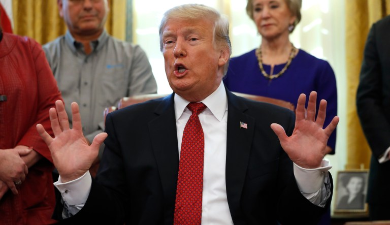 President Trump speaks during a meeting with American manufacturers in the Oval Office of the White House, Thursday, Jan. 31, 2019, in Washington. Trump was signing an executive order pushing those who receive federal funds to "buy American."