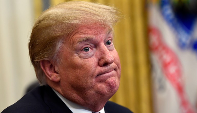 President Donald Trump listens as he meets with Chinese Vice Premier Liu He at the White House in Washington, Thursday, Jan. 31, 2019.
