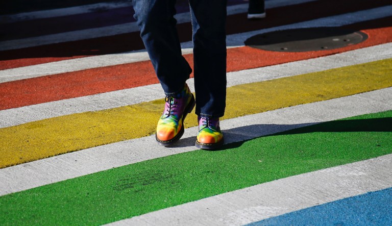 Pedestrians cross the Christopher street Thursday, June 27, 2019, in New York.