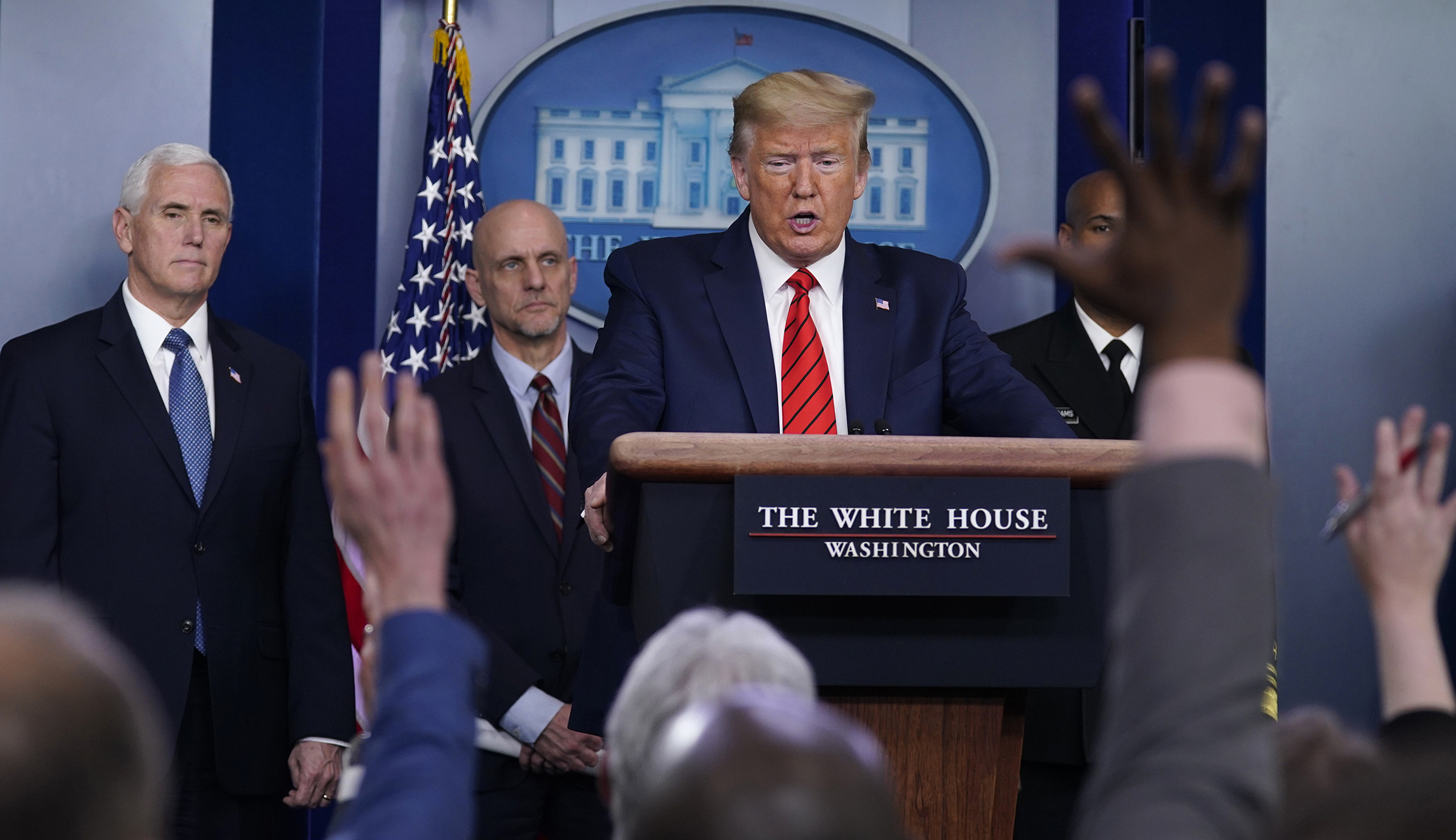 ‘You know you’re fake’: Trump briefings are a war with the press he knows his base will love
