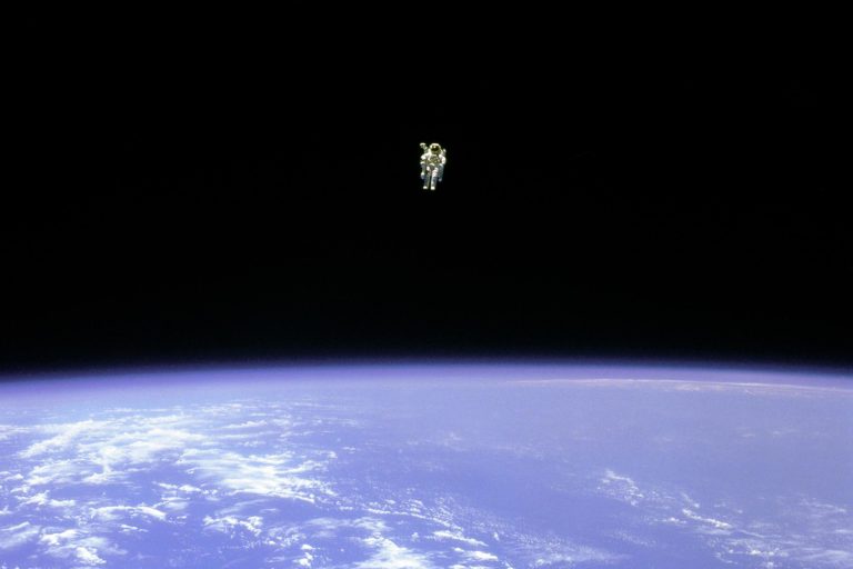 FILE - In this Feb. 12, 1984 photo made available by NASA, astronaut Bruce McCandless uses a nitrogen jet-propelled backpack, a Manned Manuevering Unit, outside the space shuttle Challenger. Astronaut wannabe Rachel Zimmerman-Brachman, a public engagement specialist at NASA's Jet Propulsion Laboratory, says that isolation is a lot like astronaut training. (NASA via AP)
