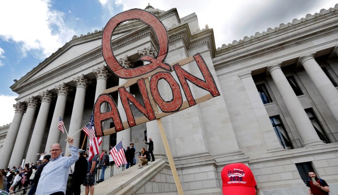 Biden says QAnon believers should seek mental health treatment ‘while it still exists under’ Obamacare