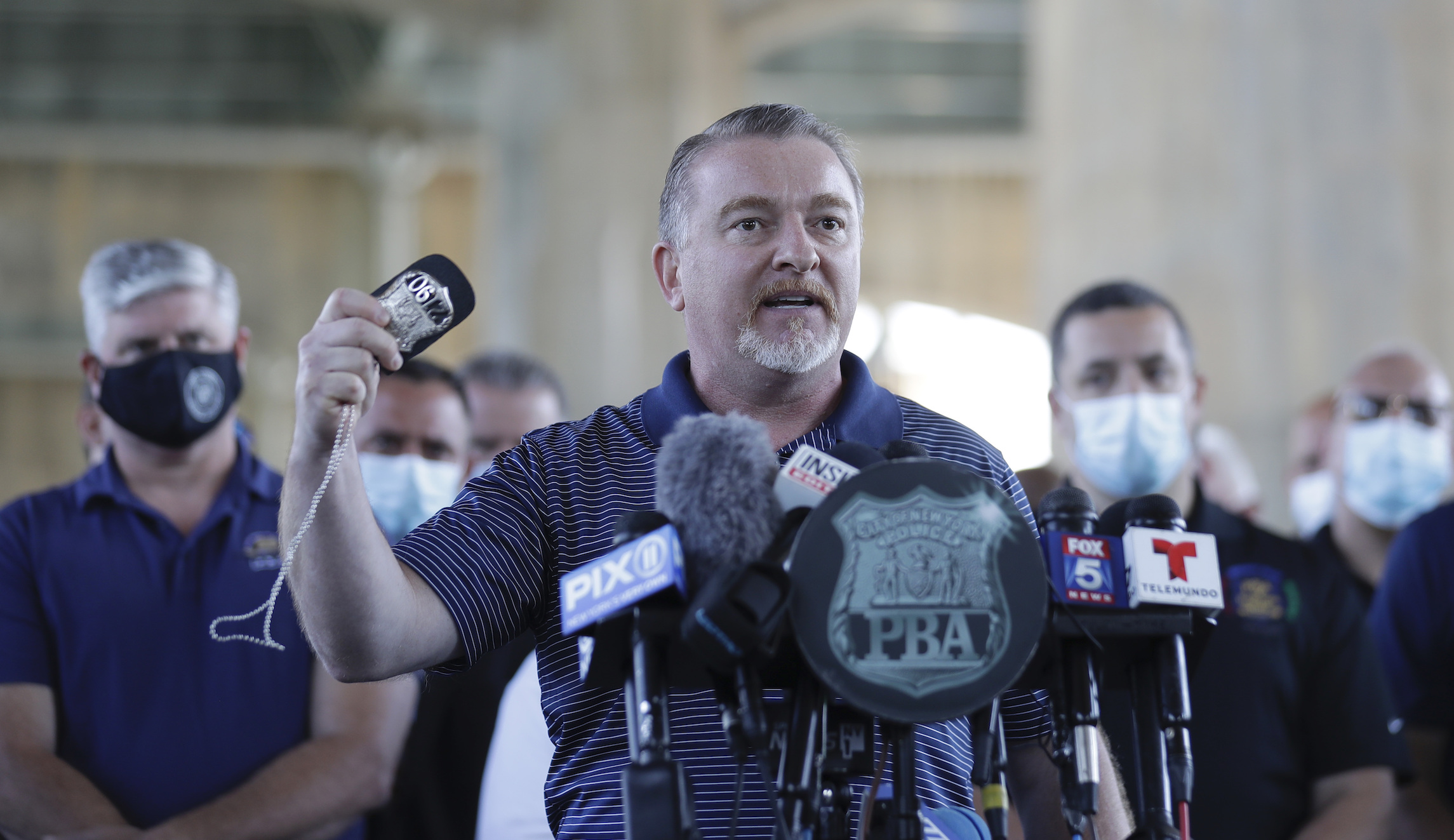 ‘Stop treating us like animals and thugs’: Head of New York police union snaps at critics