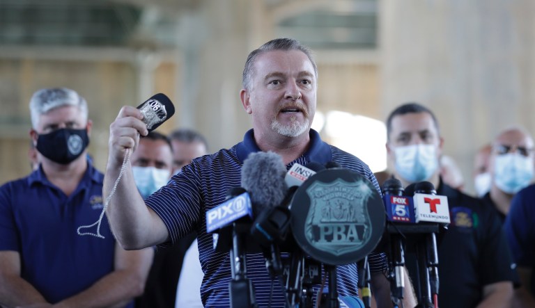 ‘Stop treating us like animals and thugs’: Head of New York police union snaps at critics