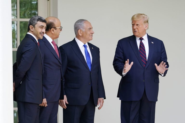 President Donald Trump walks to the Abraham Accords signing ceremony at the White House, Tuesday, Sept. 15, 2020, in Washington with Israeli Prime Minister Benjamin Netanyahu, Bahrain Foreign Minister Khalid bin Ahmed Al Khalifa and United Arab Emirates Foreign Minister Abdullah bin Zayed al-Nahyan.