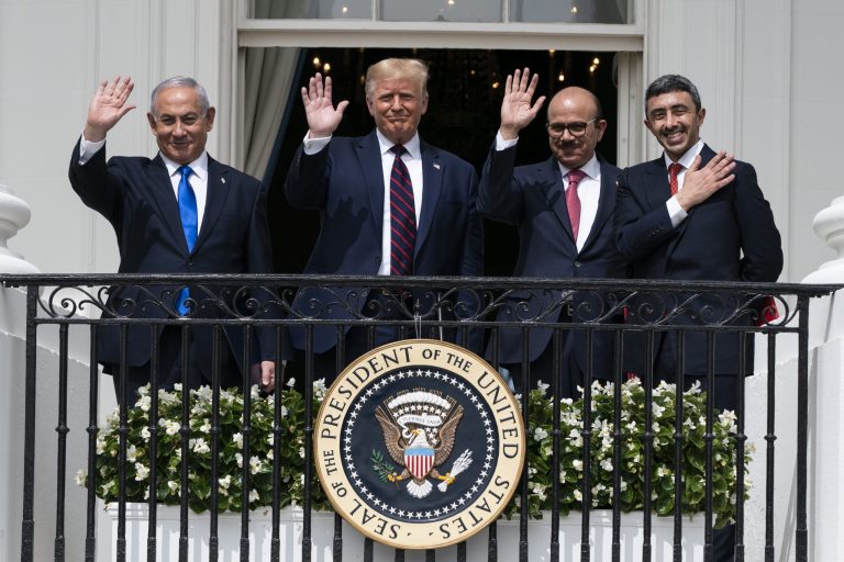 Israeli Prime Minister Benjamin Netanyahu, left, President Donald Trump, Bahrain Foreign Minister Khalid bin Ahmed Al Khalifa and United Arab Emirates Foreign Minister Abdullah bin Zayed al-Nahyan react on the Blue Room Balcony after signing the Abraham Accords during a ceremony on the South Lawn of the White House, Tuesday, Sept. 15, 2020, in Washington.