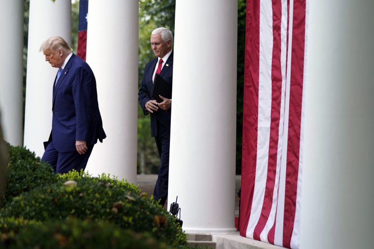 President Donald Trump arrives in the Rose Garden with Vice President Mike Pence Monday to speak about coronavirus testing shipments to states.