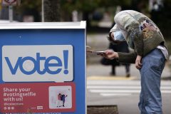 Oregon city to station police officers at ballot drop-off locations