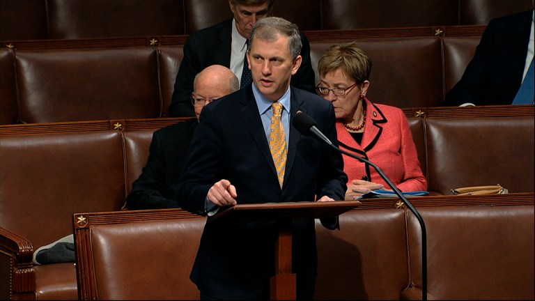 In this Dec. 18, 2019, photo, Rep. Sean Casten speaks on the House floor as the House of Representatives debates the articles of impeachment against President Donald Trump at the Capitol in Washington.