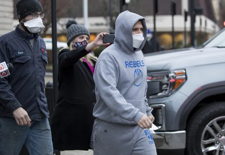 West Virginia Delegate Derrick Evans exits the Sidney L. Christie U.S. Courthouse and Federal Building after being arraigned on federal charges Friday, Jan. 8, 2021, in Huntington, West Virginia.