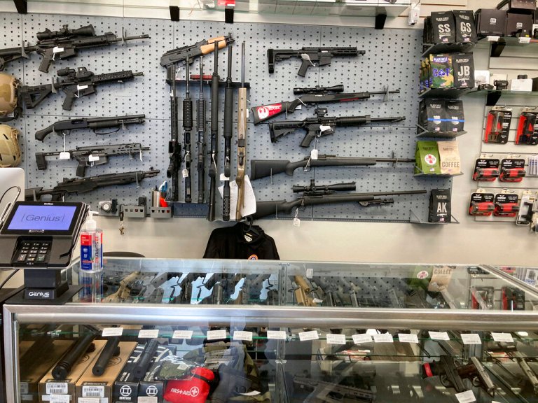 Gun stores, like this in Salem, Ore., continue to see brisk sales.