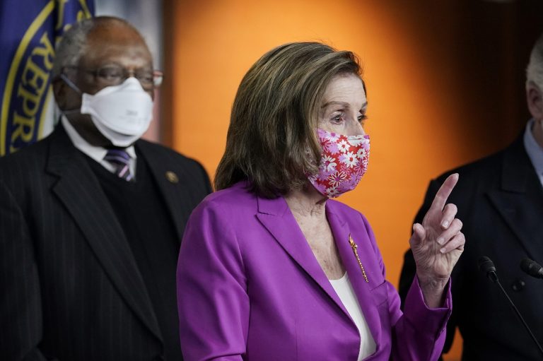 Speaker of the House Nancy Pelosi, D-Calif., holds a news conference ahead of the vote on the Democrat's $1.9 trillion COVID-19 relief bill, at the Capitol in Washington, Tuesday, March 9, 2021, as Majority Whip James Clyburn, D-S.C., looks on.