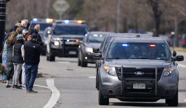 People line streets to honor officer slain in Boulder shooting
