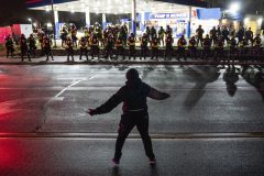 Photos show armed civilians guarding business from looters as riots continue in Minnesota
