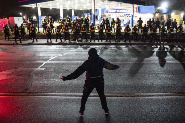 Lone man becomes furious while confronting crowd of anti-police protesters