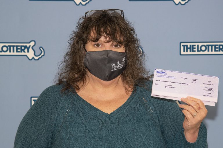 Convenience store owners return winning lottery ticket to woman who threw it away