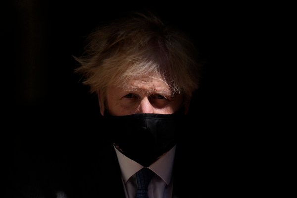 Boris Johnson holds crisis meeting as UK coronavirus variant leads to travel bans and plunging stocks