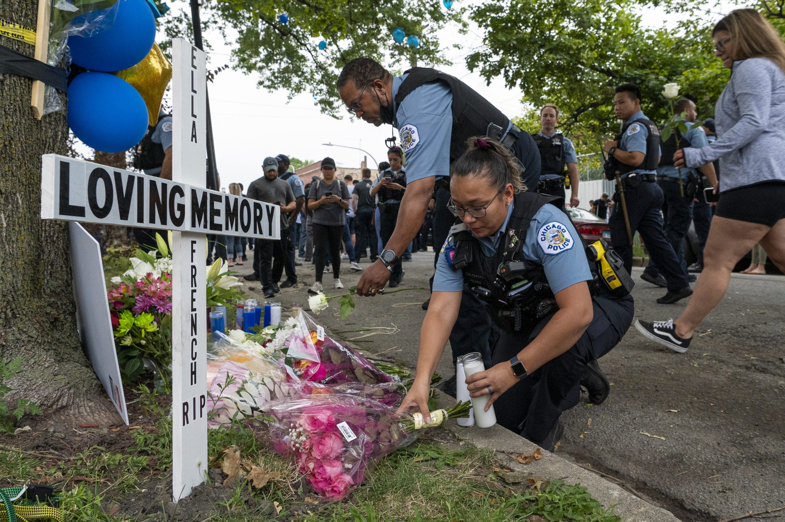 Two brothers charged in shooting that killed police officer and wounded another