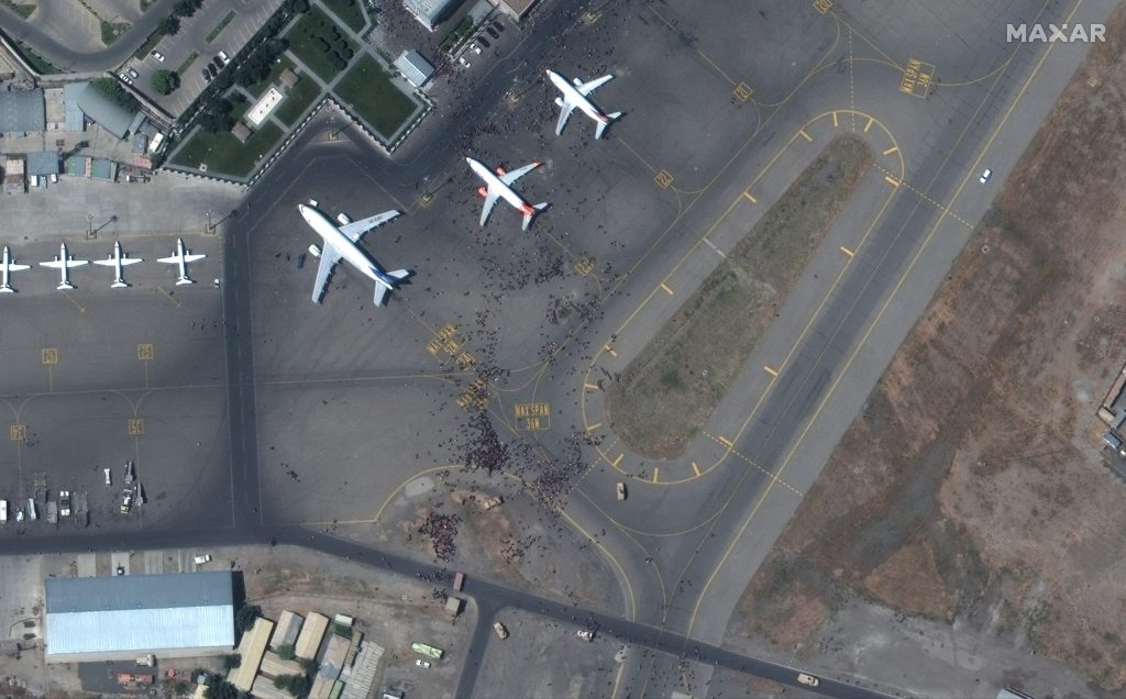 Afghan evacuations continue in bombing’s aftermath