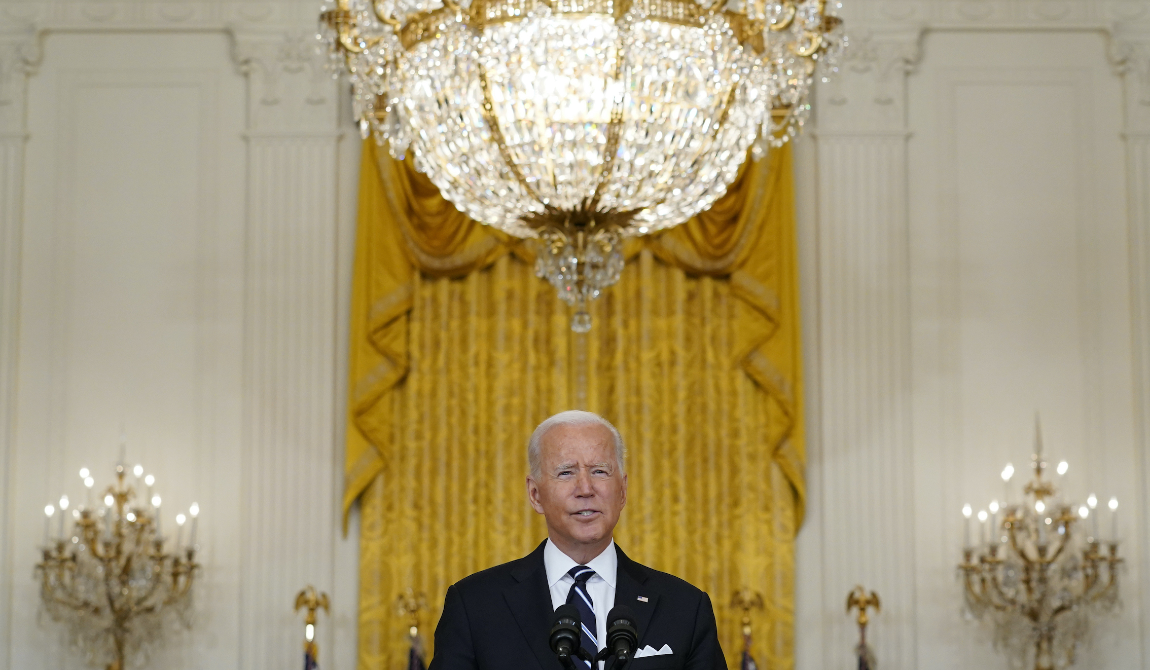 Biden tries to pivot from Afghanistan back to COVID