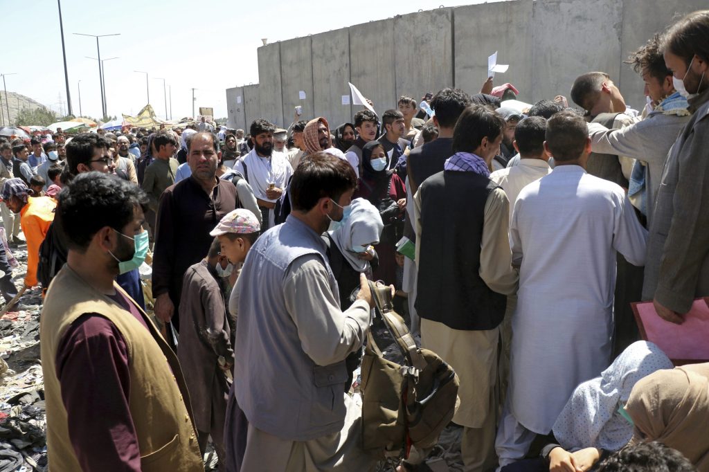 ISIS claims responsibility for explosions outside Kabul airport that killed 13 US service members