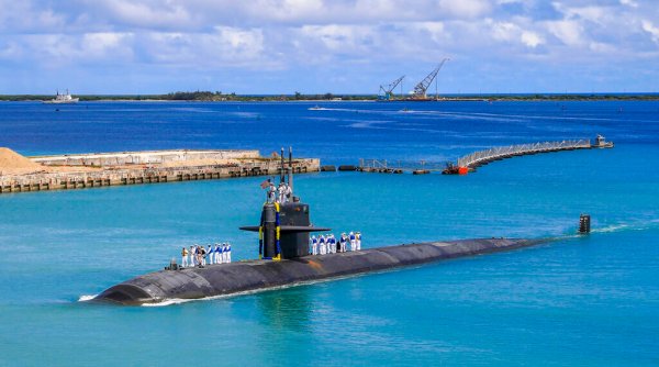 Australia unveils plan for base allowing ‘regular visits’ from US and UK nuclear submarines