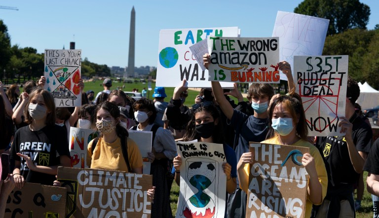 Activists gather for a global climate strike rally on Capitol Hill in Washington, on Friday, Sept. 24, 2021. Protesters around the world joined rallies on Friday as a day of worldwide demonstrations calling for action against climate change.