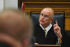 Rittenhouse judge dismisses underage gun charge