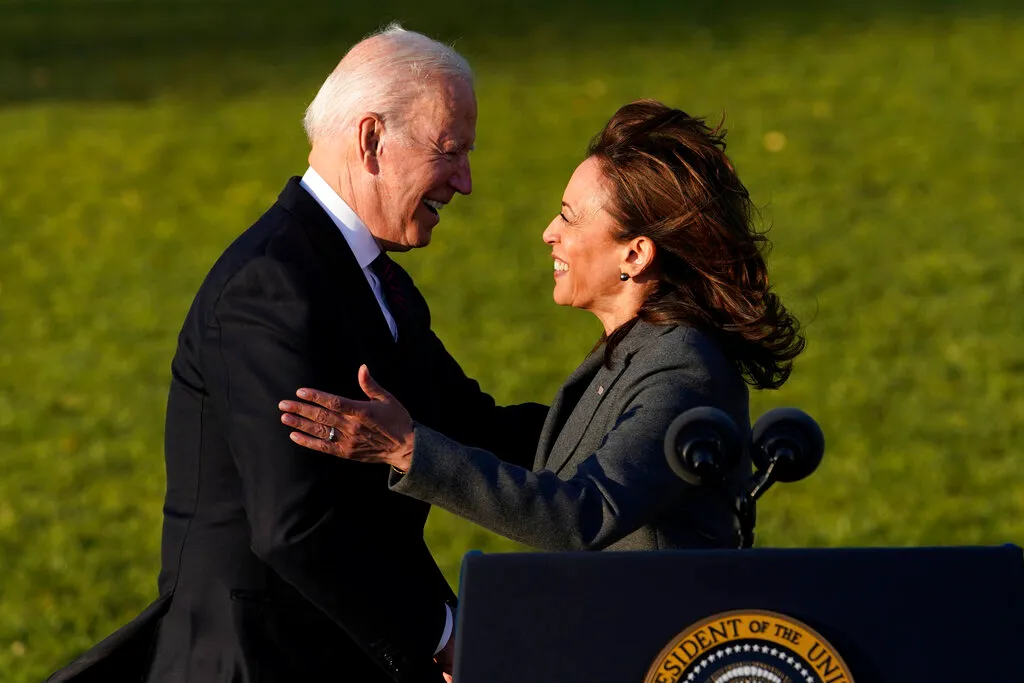 Biden and Harris hug and smile during infrastructure signing despite conflict rumors