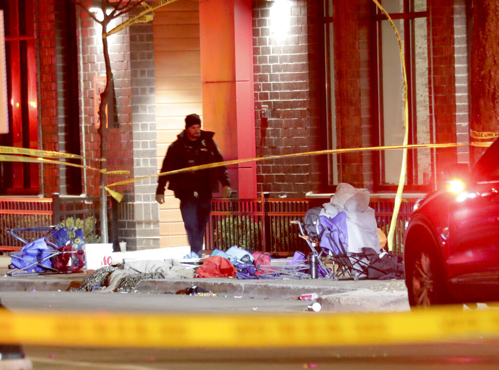 Multiple deaths and injuries after car plows through Christmas parade in Wisconsin