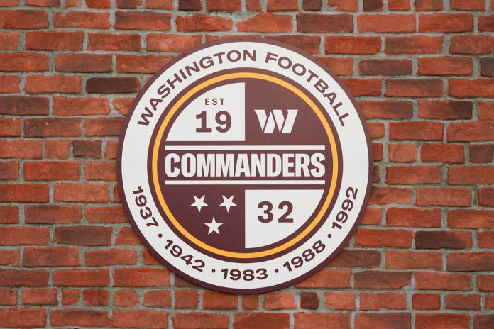 A Washington Commanders sign is shown as they unveil their NFL football team's new identity, Wednesday, Feb. 2, 2022, in Landover, Md. 