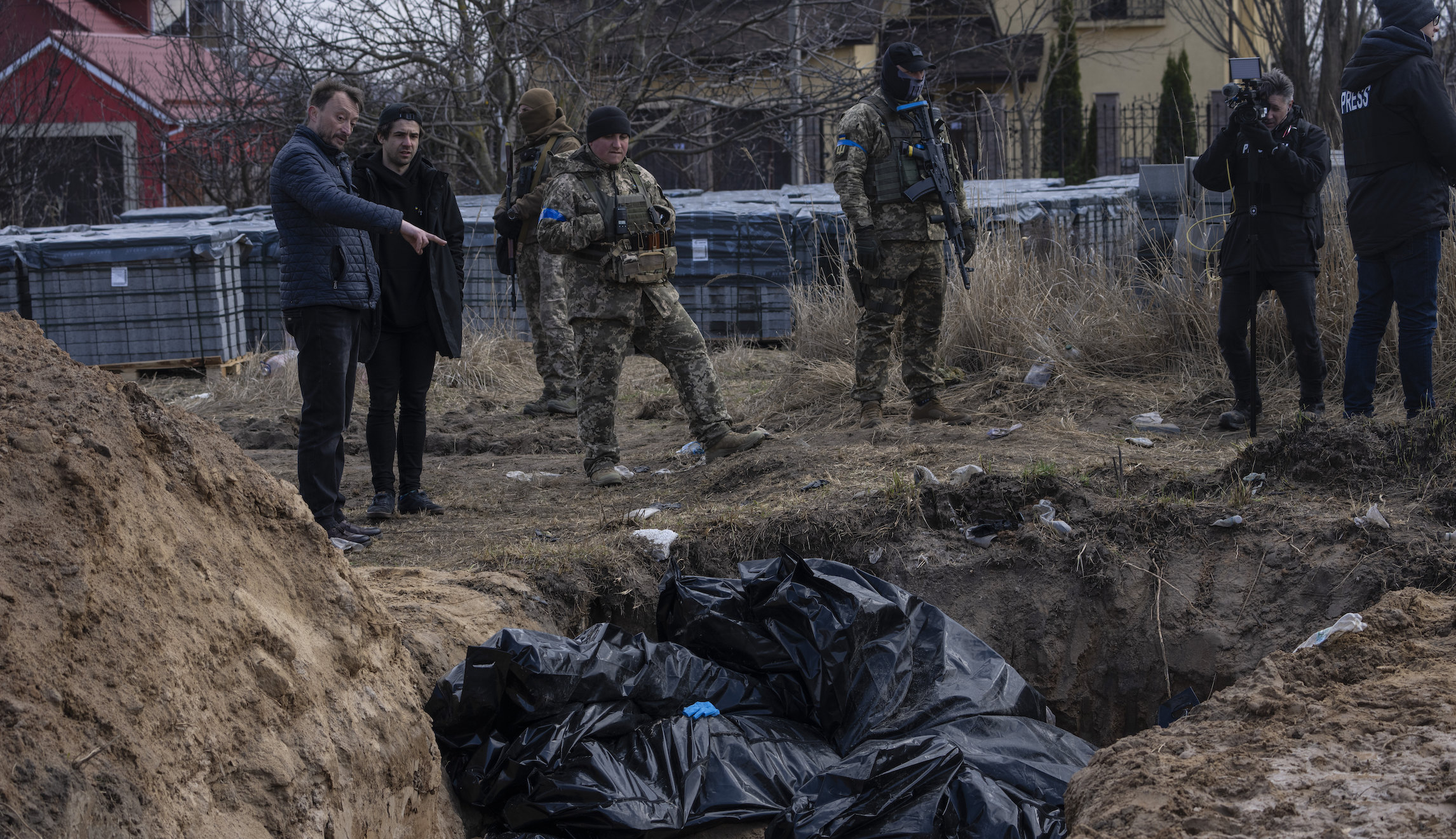 White House not ready to label Russian war crimes genocide