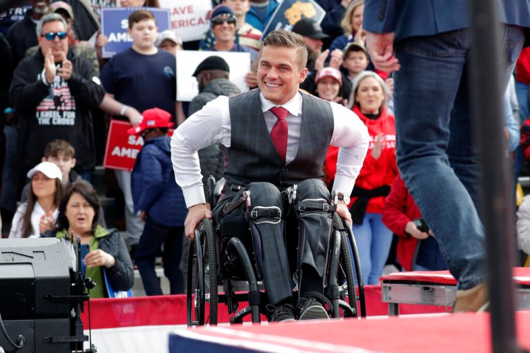 Rep. Madison Cawthorn, a Republican from North Carolina, takes the stage to address the crowd at a rally on April 9, 2022, in Selma, North Carolina.