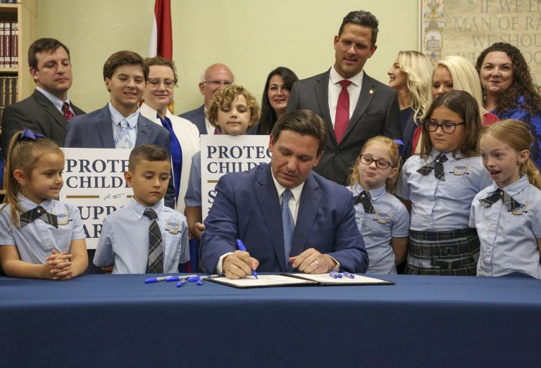 Florida Gov. Ron DeSantis signs the Parental Rights in Education bill.
