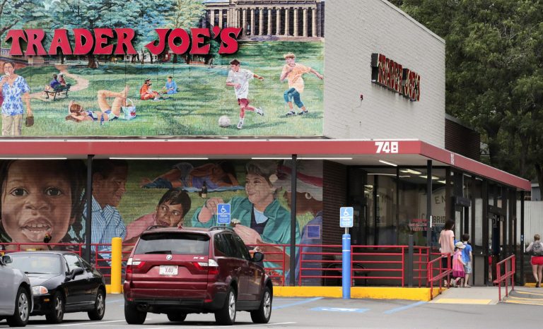 Customers walk to a Trader Joe's market, Aug. 13, 2019, in Cambridge, Mass. FinanceBuzz is offering applicants $1,000 to anyone who tries fall foods from Trader Joe's. (AP Photo/Charles Krupa, File)