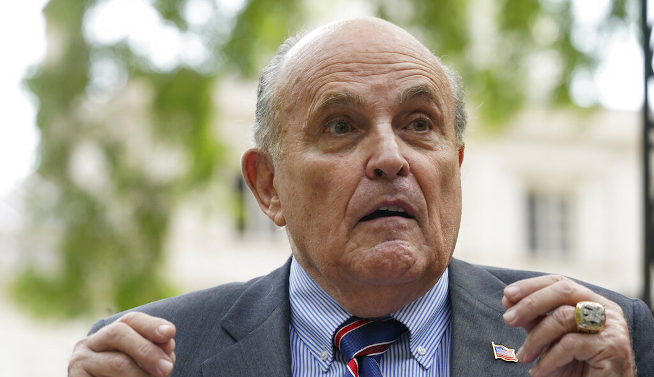 WATCH: Rudy Giuliani slapped while campaigning for son Andrew in New York