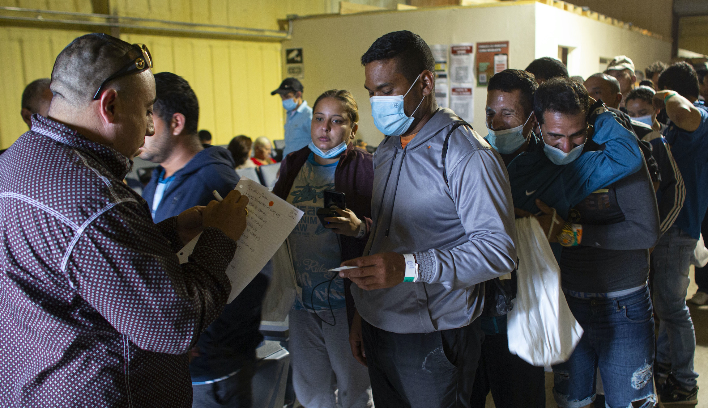 What does Biden plan to do with migrants not granted asylum?