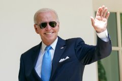 Biden takes COVID-19 victory lap, and shot at Trump, after negative test