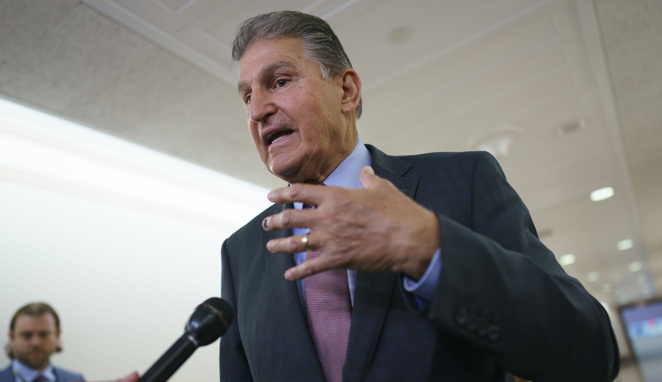 COVID looms over timing for Senate vote on Manchin-backed spending deal