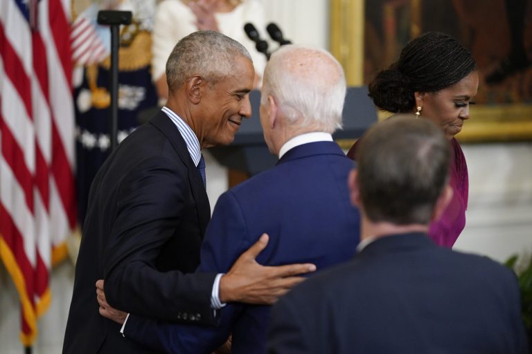 Former President Barack Obama hugs President Joe Biden as he and former first lady Michelle Obama take their seats after speaking during a ceremony in the East Room of the White House, Wednesday, Sept. 7, 2022, in Washington. An old manuscript written by a friend of Obama stated that the future president chided liberals for making do with a ârudderless pragmatism.â (AP Photo/Andrew Harnik)