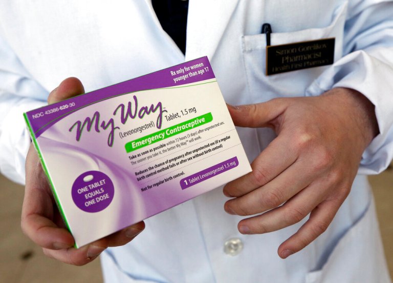 Pharmacist Simon Gorelikov holds a generic emergency contraceptive at the Health First Pharmacy in Boston on May 2, 2013. 