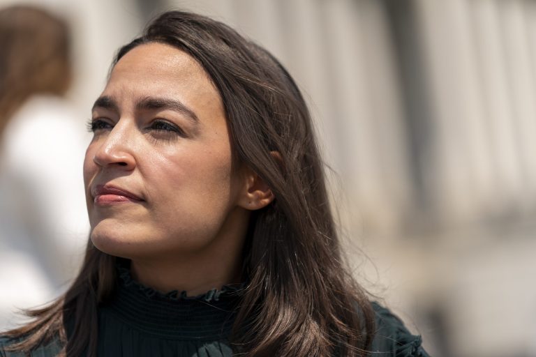 FILE - Rep. Alexandria Ocasio-Cortez, D-N.Y., joins female House Democrats at an event ahead of a House vote on the Women's Health Protection Act and the Ensuring Women's Right to Reproductive Freedom Act at the Capitol in Washington, July 15, 2022. Ocasio-Cortez warned on Friday, Oct. 28, that US is 