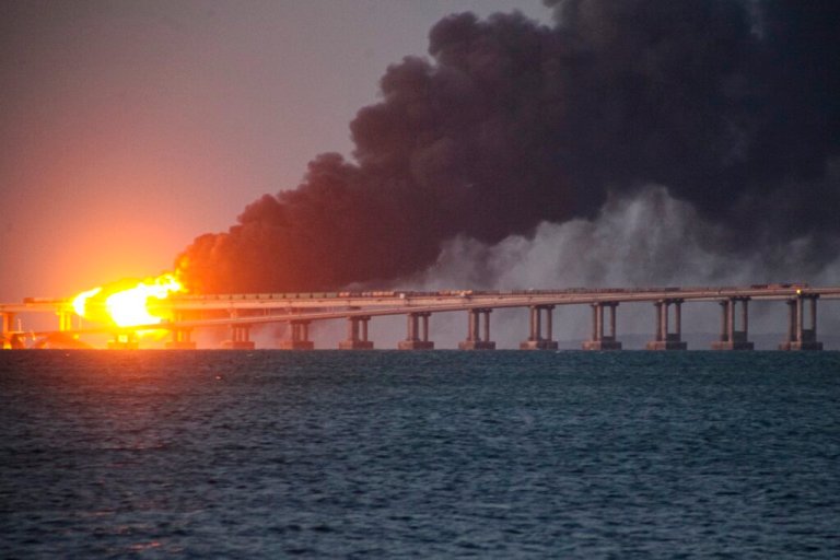 The Ukrainian Defense Ministry appeared to celebrate an explosion that destroyed the Kerch Bridge linking Russia to the Crimean peninsula Saturday morning.